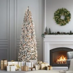 9 Ft. Pre-Lit Acacia Flocked Slim Tree With Clear Lights 16 9 Ft. Pre-Lit Acacia Flocked Slim Tree With Clear Lights -Christmas Trees Sales AC100 300 90F SLifestyle1