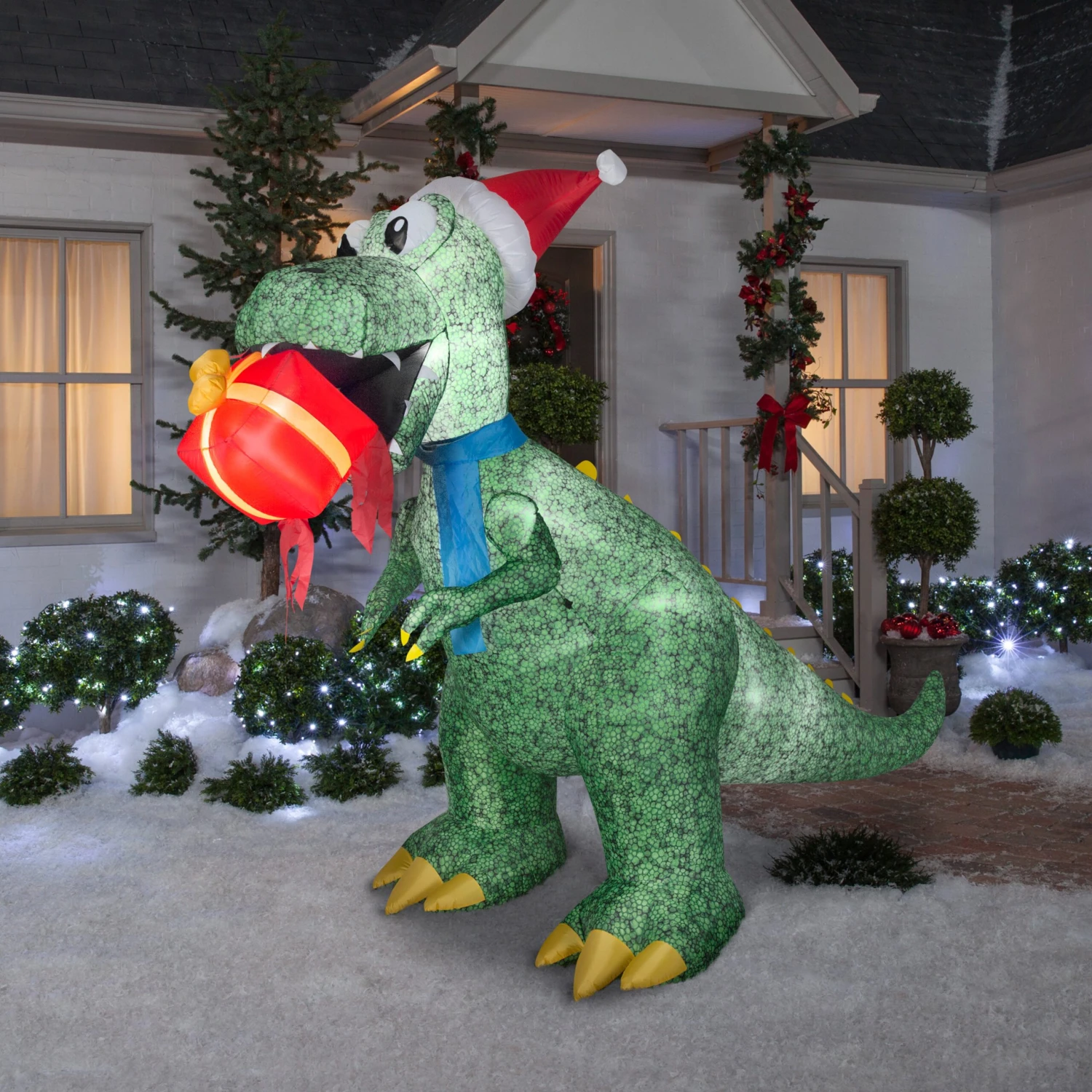 9.5 Ft. Inflatable Tyrannosaurus Rex With Gift And LED Lights 2 9.5 Ft. Inflatable Tyrannosaurus Rex With Gift And LED Lights - Image 2