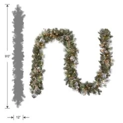 9 Ft. Pre-Lit Glittery Pine Pomegranate Garland With Clear Lights -Christmas Trees Sales GTP1 302 9B 1 Silo Dim