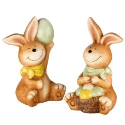 7 In. Easter Bunnies Holding Eggs Table Decoration