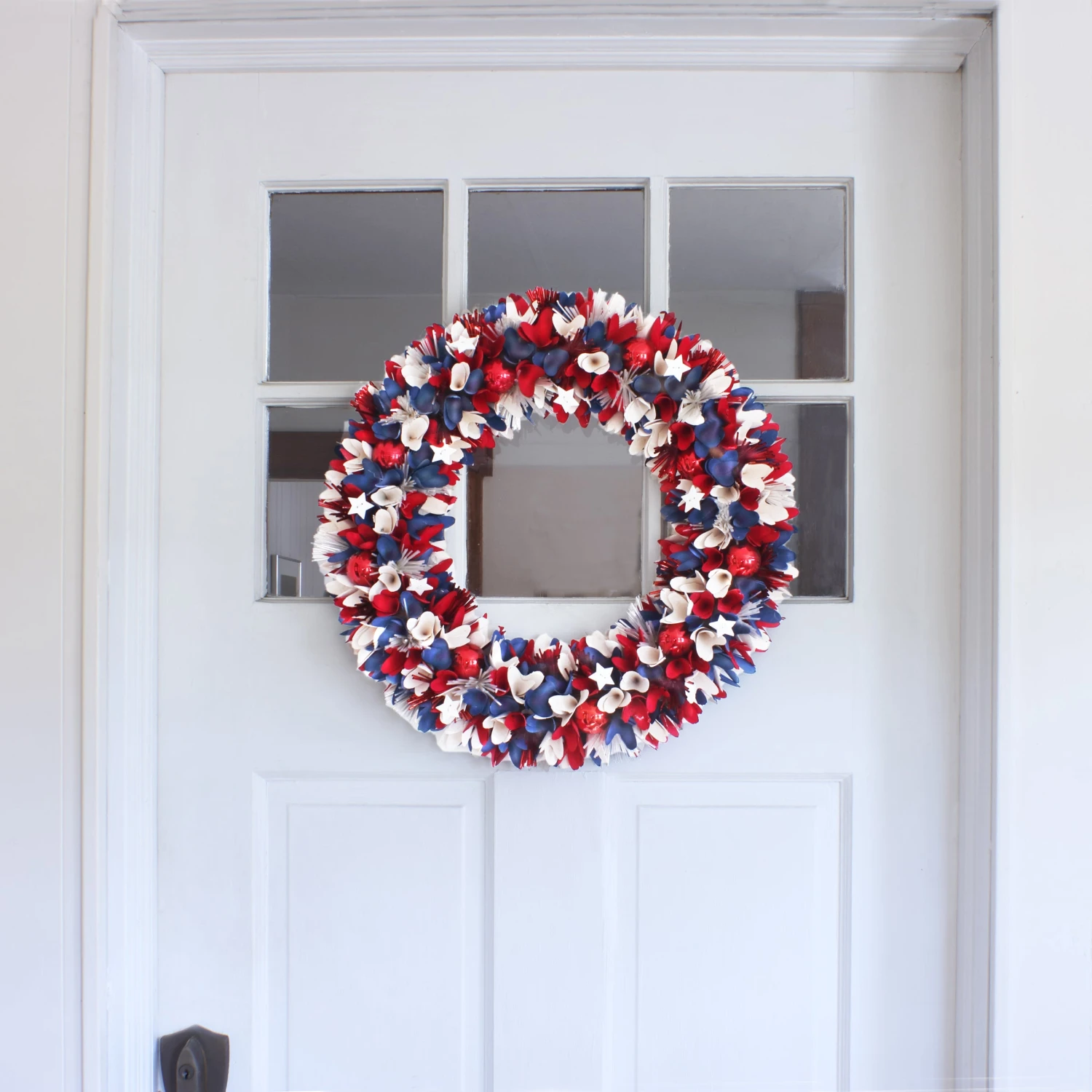 21 In. Patriotic Wreath With Red White And Blue Flowers Petals Tinsel 2 21 In. Patriotic Wreath With Red White And Blue Flowers Petals Tinsel - Image 2