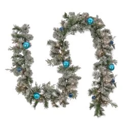 9 Ft. Pre-Lit Snowy Tinkham Pine Garland With LED Lights